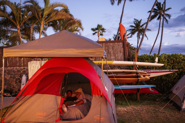 Frank Puglisi in a tent while camping in Paul Romero’s backyard in Kihei, Hawaii. Puglisi lost his boat, which he lived aboard, in Lahaina to the wildfire.