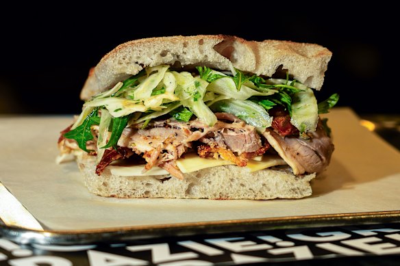 Saluministi’s porchetta sandwich is going back to 2016 prices this month.