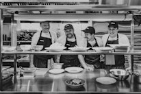 The Farra Dining kitchen team is led by head chef Aaron Moore (second from left) and Jack Henderson (far right) -
