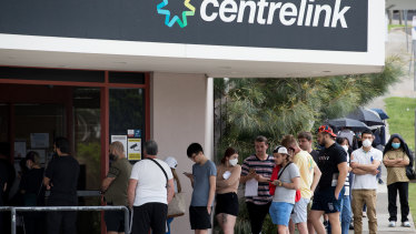 People queue up at a Sydney Centrelink in March after many people lost their jobs due to the coronavirus lockdowns.