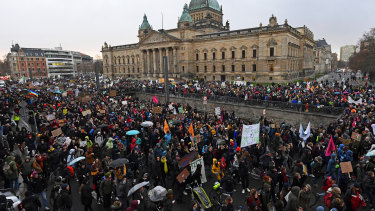 Thousands of demonstrators attend a protest climate strike ralley of the 'Friday For Future Movement' in front of the Federal Administrative Court building in Leipzig, Germany, on Friday.
