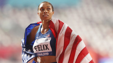 Allyson Felix of the US reacts after setting a new world record in the 4x400m mixed relay.