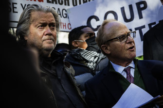 Steve Bannon (left) and his attorney David Schoen speak to the media after Bannon surrendered to authorities in Novemver 2021.
