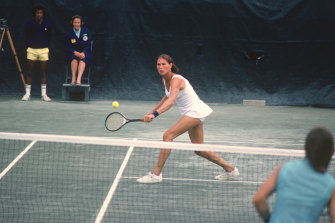 Renee Richards hits a return during the Women’s 1977 US Open tennis championship.
