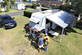 Colin Mitchell and his family at Marlo Caravan Park. They have lived in a caravan for three years and have no home to return to so are staying in the park.