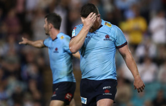 Waratahs prop Paddy Ryan trudges off after receiving a late red card.
