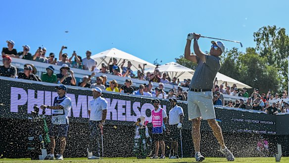 Phil Mickelson tees off on the party hole.