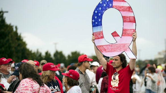 A QAnon sign at a Donald Trump rally. Believers say the US President will overcome the shadowy powers that control the country.