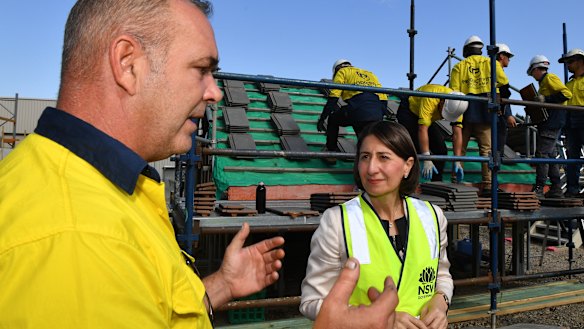 NSW Premier Gladys Berejiklian with Paul Breen, founder of Productivity Bootcamp, during a visit to the Productivity Bootcamp in Construction at Quakers Hill.