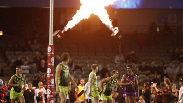 Running riot: Team Rampage celebrate the winning goal of the AFLX grand final against the Flyers at Marvel Stadium.