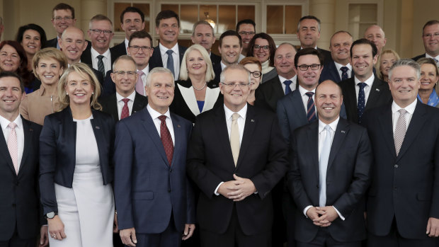 Prime Minister Scott Morrison with his new-look ministry after the swearing-in ceremony.