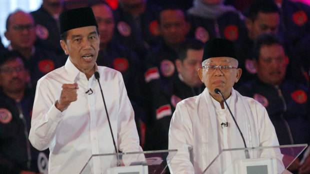 Indonesian President Joko Widodo and his running mate Ma'ruf Amin during the televised debate in Jakarta on Thursday night.