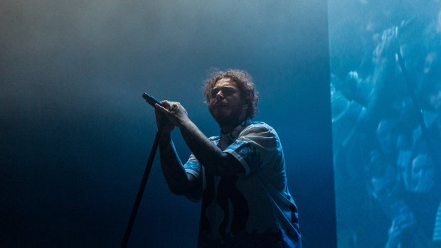 Post Malone was alone on stage during a fiery and fun Sydney show.