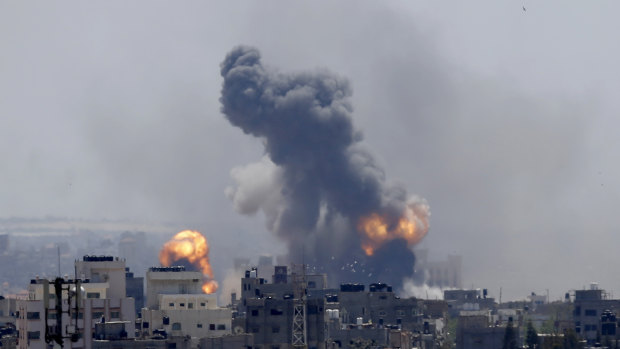 Smoke rises from an explosion caused by an Israeli airstrike in Gaza City.
