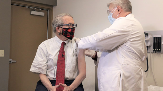 Ohio Governor Mike DeWine gets his first dose of the COVID-19 in February.