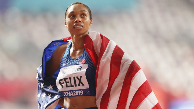 Allyson Felix of the US reacts after setting a new world record in the 4x400m mixed relay.