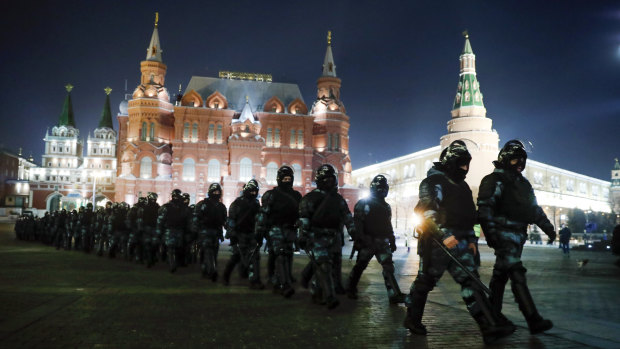 Servicemen of the Russian National Guard gather at the Red Square to prevent a protest rally in Moscow, Russia.