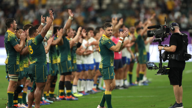 The Wallabies thank the crowd after their routine victory.