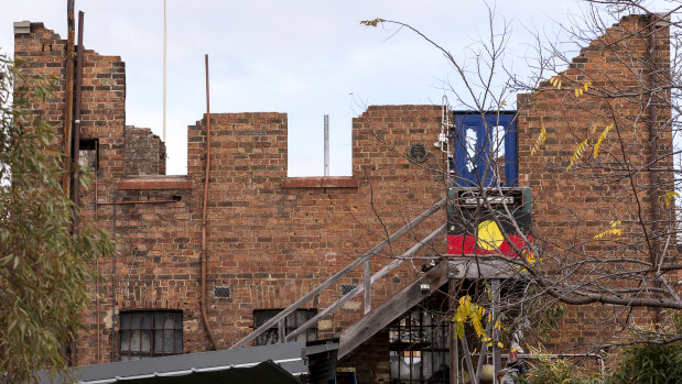 Still standing: The four walls of La Mama Theatre will be incorporated into the rebuild.