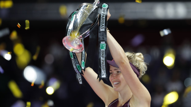 Elina Svitolina celebrates after winning the WTA Finals in Singapore.