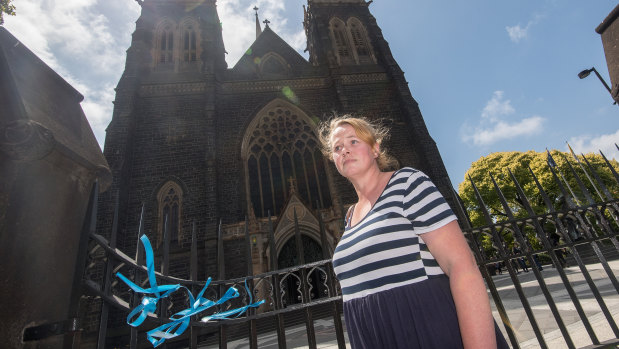 Heather Ryan tied ribbons to the gates of St Patrick's Catherdral in support of victims of sexual abuse by the Catholic Church.