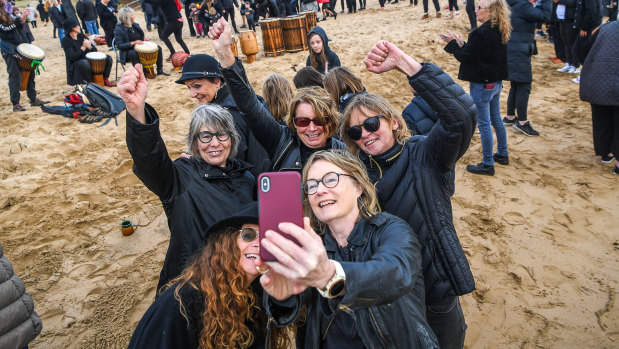 Protesters at Torquay beach on Monday morning.