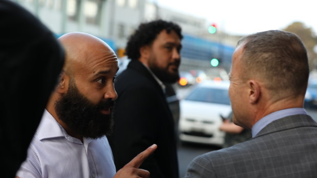 Mina Greiss confronts media after his friend Jarryd Hayne was sentenced in  Newcastle in May 2021.