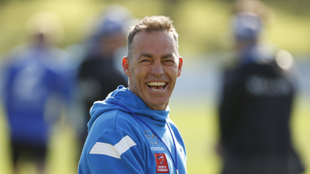 North Melbourne coach Alastair Clarkson takes training for the first time since taking leave in May.