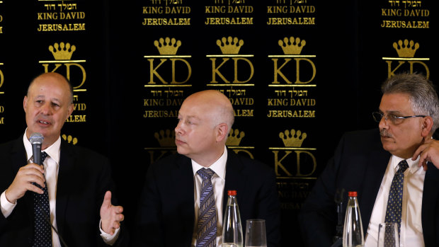 Israeli Minister of Regional Cooperation Tzachi Hanegbi, left, with Trump's Middle East envoy Jason Greenblatt, centre, and Palestinian Water Authority head Mazen Ghoneim.