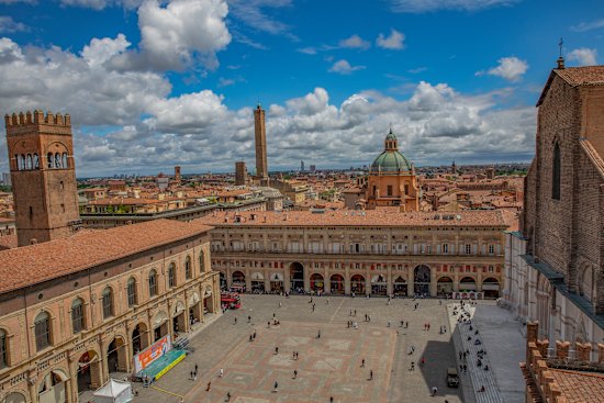 View over Bologna’s Piazza Maggiore, with Garisenda and Asinelli towers in the distance.