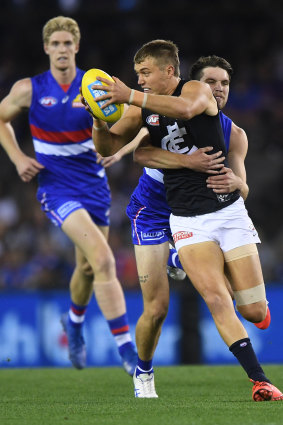 Dog fight: Vote leader Patrick Cripps and his Carlton teammates bagged a breakthrough win over the Western Bulldogs at Marvel Stadium.