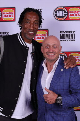 Billionaire businessman Larry Kestelman (right), who will now run the WNBL, pictured with NBA great Scottie Pippen.