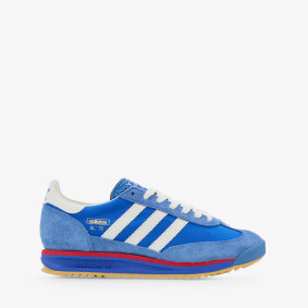Tim Ross wears Adidas “SL 72 ” sneakers to feel a bit glamorous when travelling.