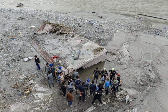 A rescue team at the house where Chandika Shrestha was found in Betrawati.