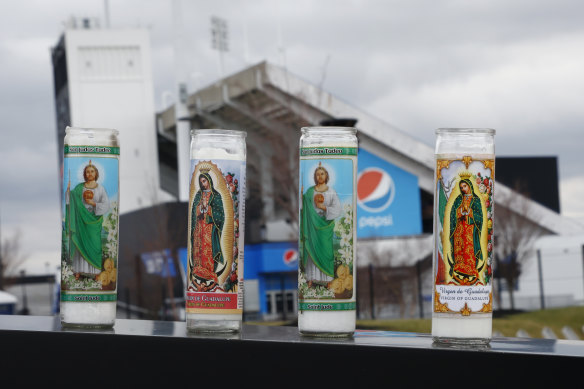 Candles outside Buffalo’s home ground in support of Damar Hamlin.