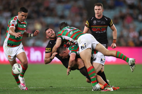 Kurt Capewell takes a big hit at ANZ Stadium.