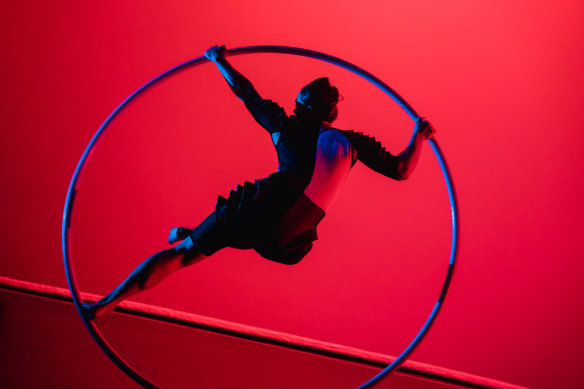 Merlene Hutt on the cyr wheel in Muse.