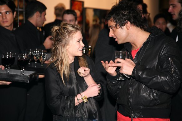 Mary-Kate Olsen and Andy Valmorbida at a New York art show in 2009.