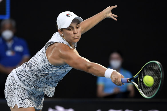 Ash Barty stretches for the ball.