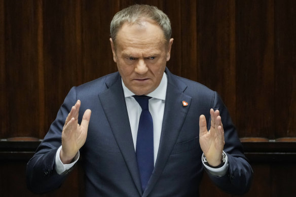 Polish Prime Minister Donald Tusk speaks at the Sejm, the lower house of parliament, in Warsaw, Poland, on Friday. European countries are preparing for a future without the United States in their corner.