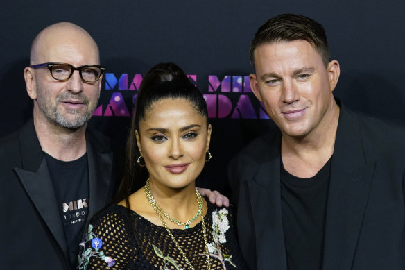 Director Steven Soderbergh, left, poses with actors Salma Hayek, center, and Channing Tatum at the premiere of the film.