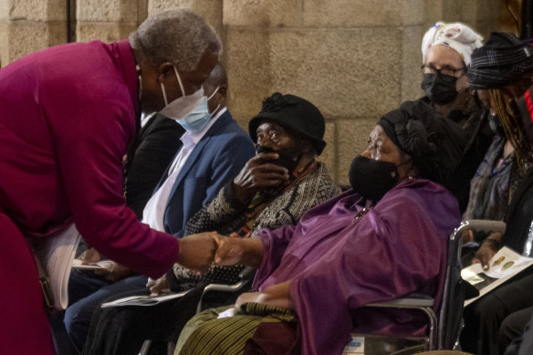 Archbishop of Cape Town Thabo Makgoba greets Desmond Tutu’s widow, Leah. 