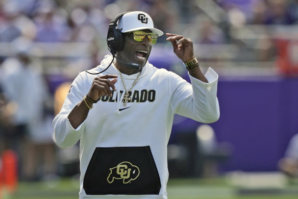 Colorado coach Deion Sanders gets a point across.