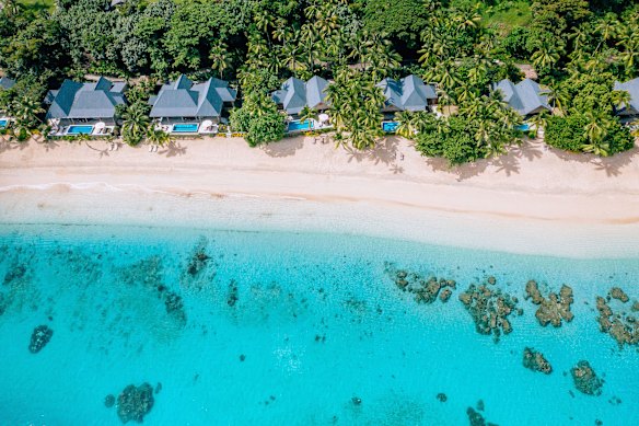 Beach villas and the pristine lagoon.