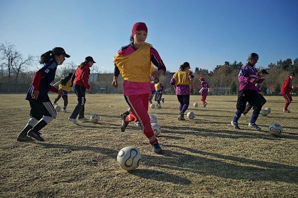 The Afghan women’s soccer team practicing in a Kabul field in 2010. 