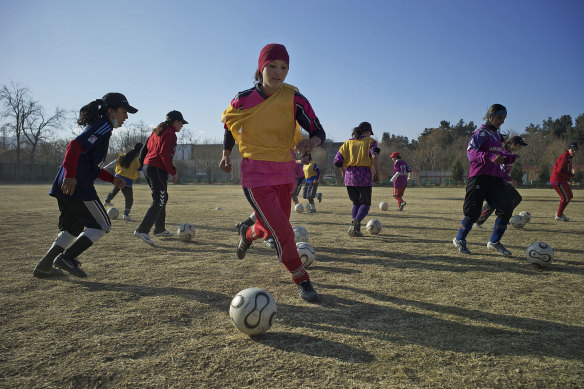 The Afghan women’s soccer team practicing in a Kabul field in 2010. 