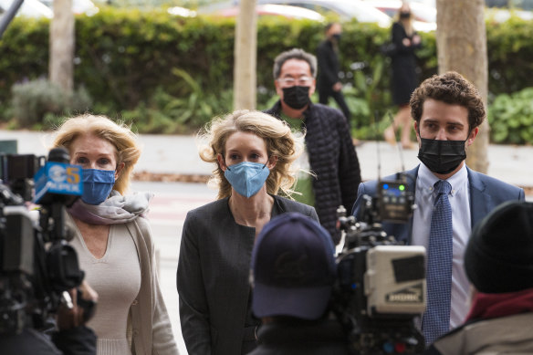 Elizabeth Holmes (centre) arriving at court in January.