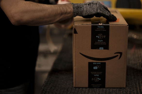 Warehouse workers get a pay bump as Amazon struggles to find enough staff to handle the pandemic-fuelled boom in orders.