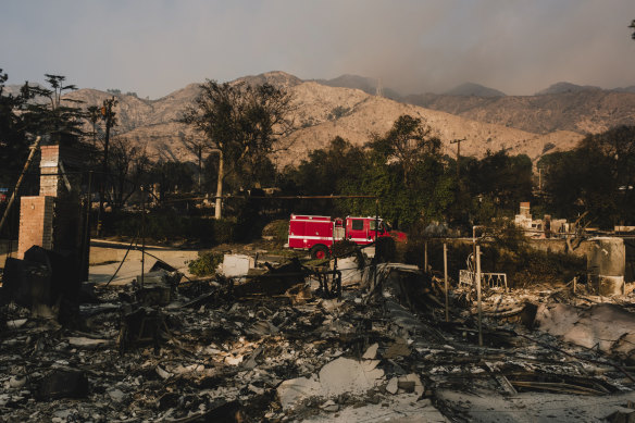 Destroyed homes in a neighbourhood of Altadena. Entire neighbourhoods in the town of about 42,000, a scenic and charming historically black enclave, have become deserts of ash.