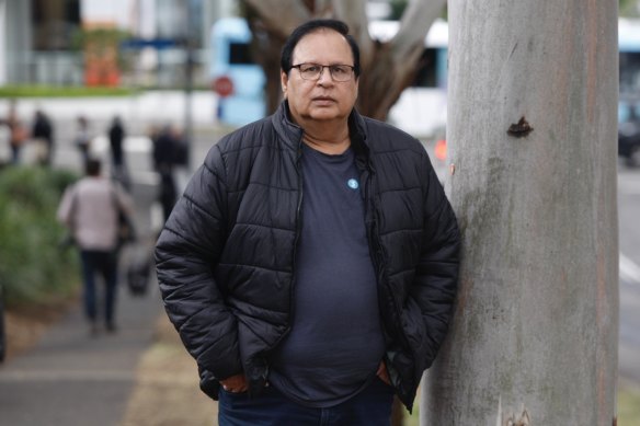 Sanjeev Raja, 68, received his COVID-19 vaccine at the Sydney Olympic Park clinic on Monday.